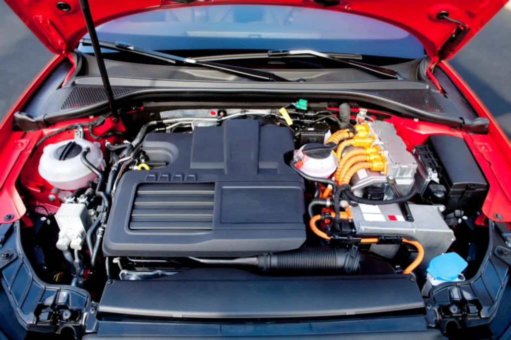 Hybrid technician performing diagnostics and inspection on a hybrid vehicle in Tucson, Arizona