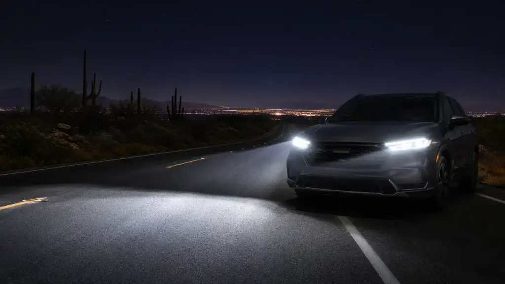 Vehicle using properly aimed LED headlights on a Tucson desert road at night